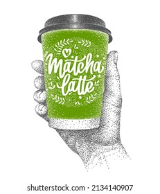 Matcha latte to go. Green tea takeaway. Paper cup in human hand. Vector hand-drawn sketch. Lettering and decorative elements in doodle style.