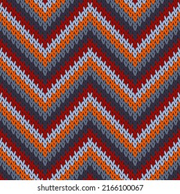 Material zigzag chevron stripes christmas knit geometric seamless pattern. Scarf knit effect ornament. Classic warm seamless knitted pattern. Repeatable background.