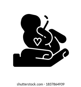 Maternity ward black glyph icon. Pregnancy and childbirth. Maternity department. Motherhood. Pregnant women care center. Silhouette symbol on white space. Vector isolated illustration