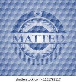 Matted blue emblem with geometric background.