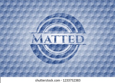 Matted blue emblem with geometric background.