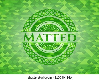 Matted green emblem. Mosaic background