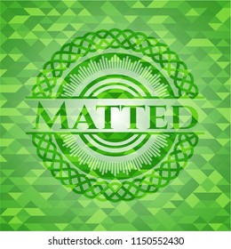 Matted green emblem. Mosaic background