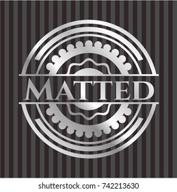 Matted silvery badge