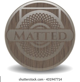 Matted wooden emblem