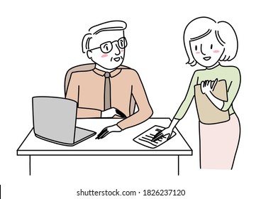 Mature businessman sitting at desk and talking with young female coworker standing nearby. Young secretary putting paper on elderly manager's desk. Female assistant placing paper sheet on boss's desk.