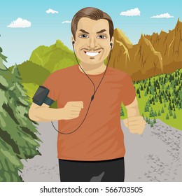 mature man jogging in mountains with smartphone armband listening to music playlist on mobile phone app