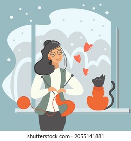 A mature woman knits warm clothes at home. Outside the window is a snowy winter, a beautiful picturesque landscape. An elegant lady in a cozy house talks cutely with a cat. Flat vector in blue tones.