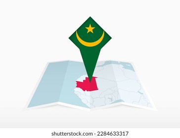 Mauritania is depicted on a folded paper map and pinned location marker with flag of Mauritania. Folded vector map.