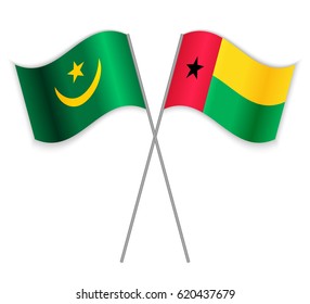 Mauritanian and Bissau-Guinean crossed flags. Mauritania combined with Guinea-Bissau isolated on white. Language learning, international business or travel concept.