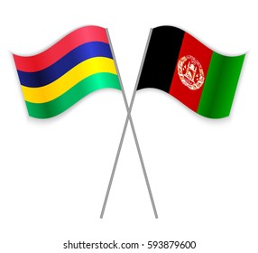 Mauritian and Afghan crossed flags. Mauritius combined with Afghanistan isolated on white. Language learning, international business or travel concept.