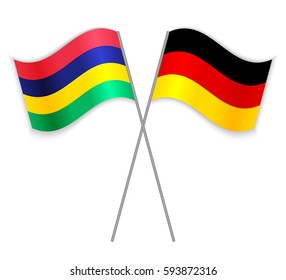 Mauritian and German crossed flags. Mauritius combined with Germany isolated on white. Language learning, international business or travel concept.