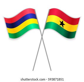Mauritian and Ghanaian crossed flags. Mauritius combined with Ghana isolated on white. Language learning, international business or travel concept.