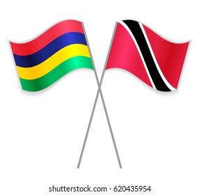 Mauritian and Trinidadian crossed flags. Mauritius combined with Trinidad and Tobago isolated on white. Language learning, international business or travel concept.