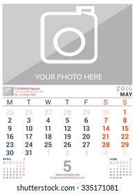 May 2016. Desk and Wall Monthly Calendar for 2016 Year. Vector Design Print Template with Place for Photo logo and description company. Week Starts Monday. Portrait Orientation