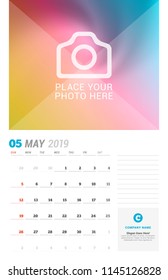May 2019. Wall calendar planner template. Vector design print template with place for photo. Week starts on Sunday