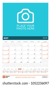 May 2019. Wall calendar for 2019 year. Vector design print template with place for photo and year calendar. Week sarts on Sunday