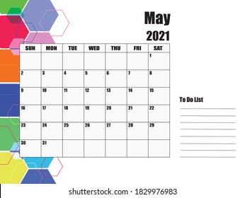 May 2021 Calendar, white background on the left, hexagons of various sizes and colors