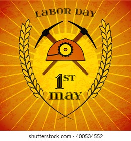 May Day. May 1st. Labor Day background with mine helmet and picks and wheat ears over retro rays background. Poster, greeting card or brochure template, symbol of work and labor, vector icon