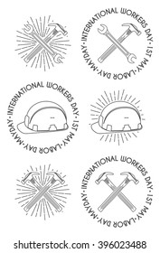 May Day. Wrench, hammer and safety helmet thin line and silhouettes labels, badges and design elements