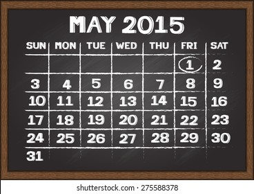 May two thousand fifteen calendar on chalkboard.