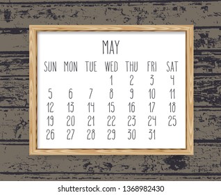 May year 2019 vector monthly calendar. Week starting from Sunday. Hand drawn text in a wooden frame over dark brown rustic distressed wood background.