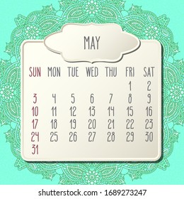 May year 2020 vector monthly calendar over doodle ornate hand drawn green floral background, week starting from Sunday. Beige beveled frames design.