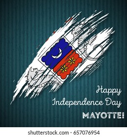 Mayotte Independence Day Patriotic Design. Expressive Brush Stroke in National Flag Colors on dark striped background. Happy Independence Day Mayotte Vector Greeting Card.