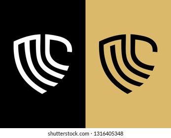 MC Letters with clean lines that a shield shape