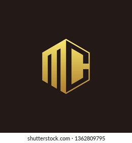 MC Logo Monogram with Negative space gold colors