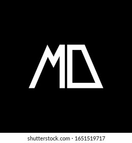 Monograma abstracto del logotipo MD aislado en fondo negro