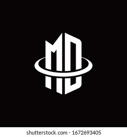 MD monogram logo in a hexagon style and surrounded by a ring