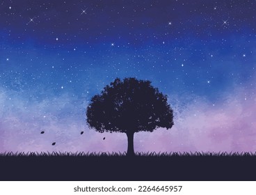 Meadow and large tree silhouette at night