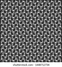 Meander stripes arranged vertically on a flecked background. Textile pattern. Paper. Monochrome. Vector illustration.