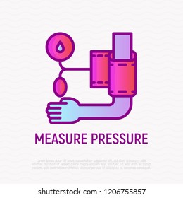 Measure pressure thin line icon: tonometer on hand. Modern vector illustration of medical procedure.