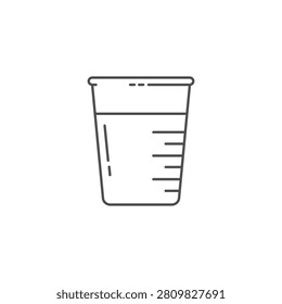 A measuring cup with lines and liquid