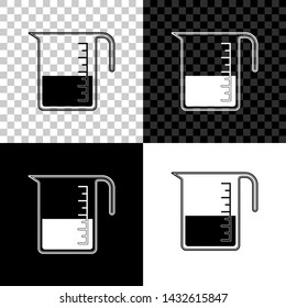 Measuring cup to measure dry and liquid food icon isolated on black, white and transparent background. Plastic graduated beaker with handle. Vector Illustration