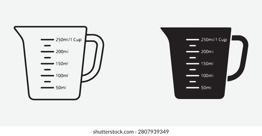 Measuring cups with milliliters and cup markings in black and white on plain background