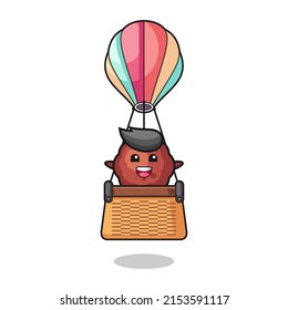 meatball mascot riding a hot air balloon , cute design