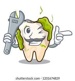 Mechanic cartoon decayed tooth with dental caries