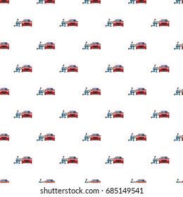 Mechanic changing wheel on red car pattern