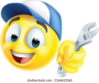 A mechanic or plumber holding a spanner or wrench emoticon face emoji icon