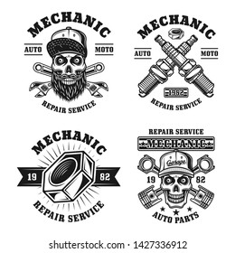 Mechanic and repair service set of four vector emblems, badges, labels, stamps or logos in vintage monochrome style isolated on white background