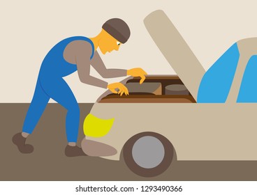 Mechanic repairs car motor