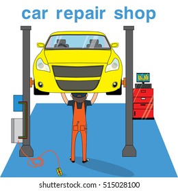 mechanic standing for repair and under the yellow car service. 