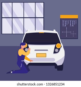 mechanic worker with car in the workshop