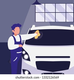 mechanic worker with car in the workshop