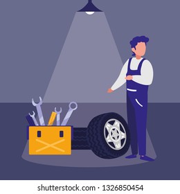 mechanic worker with tire car and toolbox