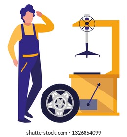 mechanic worker with tire changer machine