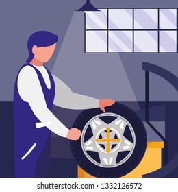 mechanic worker with tire changer machine